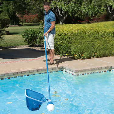 Easy Skim™ – Effortless Surface Cleaning for Pools & Spas. Pole not included - picture shows man using the easy skim in the pool.