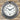18” Silver Porthole Clock - faux brass screws and bolts around frame. Clock looks like a Porthole on a ship. shown hanging on a brick wall.