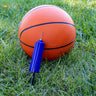 6β³ Mini Hand Pump. small and compact. picture shown next to basketball for scale.
