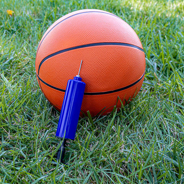 6β³ Mini Hand Pump. small and compact. picture shown next to basketball for scale.