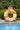 Yellow, Orange and White, large Tube with handles to hold on. Man standing next to it for scale.