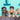 3 children holding onto side of pool each one wearing a pair of swim goggles.