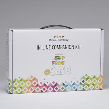 A white box titled "Mineral Harmony In-Line Companion Kit" with multi-colored geometric patterns on the bottom part in front of a white background