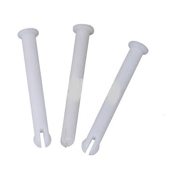 Three white plastic pins on a white background