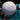 Child holding Jumbo White Beach Ball with Throw in text, in the pool.