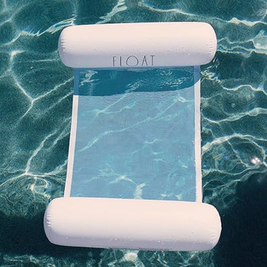 Rae Dunn Kids Hammock Float in White with text "Float" in the water