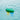 Green and yellow pool sanitizing system floating on water