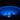 Blue illuminated pool at night with steps leading into it