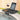 Dark gray adjustable side spa tray showing a glass of wine and electronic tablet