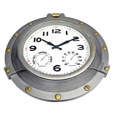 18” Silver Porthole Clock - faux brass screws and bolts around frame.  Clock looks like a Porthole on a ship. shown from a side angle for depth