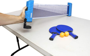 Play N Go Table Tennis - includes 2 blue paddles, 2yellow ping pong balls and a blue net that attaches to a plastic table. table not included