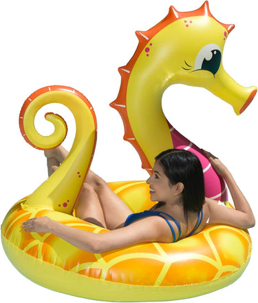 48″ Yellow Seahorse Tube, ring float shaped like a seahorse. ages 8+. shown with a girl riding inside .