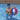 Young man standing in the pool holding the NBA inflatable Ball 24". Red white and blue with NBA Logo. For scale.