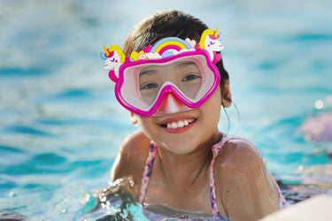 Child wearing the Unicorn themed Face mask