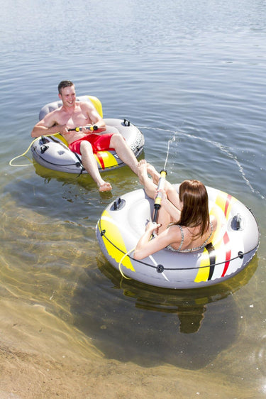 47” DLX River Cruiser Lounge With water launcher. Grey with yellow, red, white and black strip design. 2 handles to hang onto and a back rest. 2 shown on the lake battling it out with the water launchers.