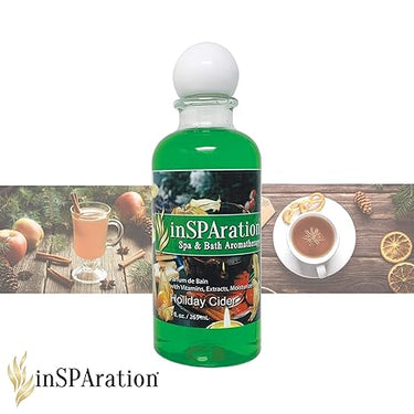 Bottle of inSPAration Spa & Bath Aromatherapy with holiday cider flavor on a white background