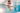 Little girl swimming underwater with the Unicorn themed face mask
