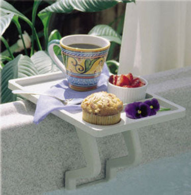Gray spa side table with muffin, fruit and cup of coffee