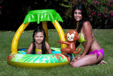 Go Bananas Monkey Pool sitting in the grass