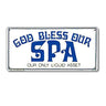 Metal sign with blue text 'GOD BLESS OUR SPA' on a white background