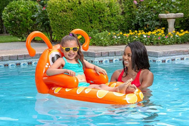 Orange Jr. Waterbug Lounge in water